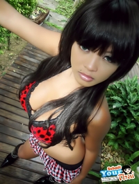 Busty thai girl strips