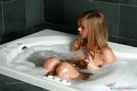 Young Kylie in bath tub