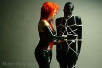 Girls in latex and gas mask