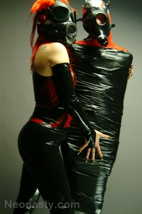Girls in latex and gas mask