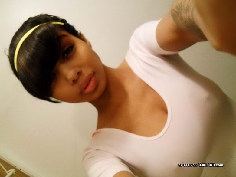 Busty mulatto chick's selfpics