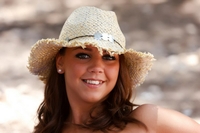 Charlene in a sun hat