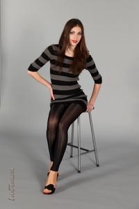 Flexy brunette posing in nylon