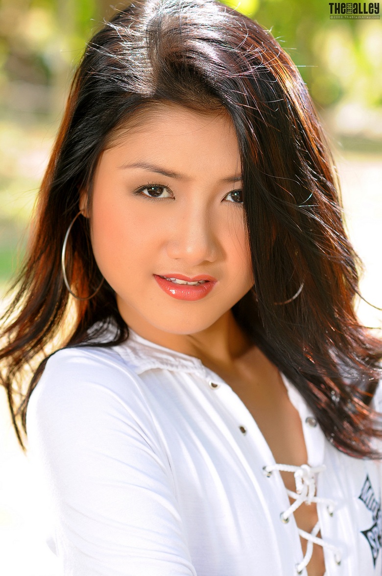 Monica Tang bends over